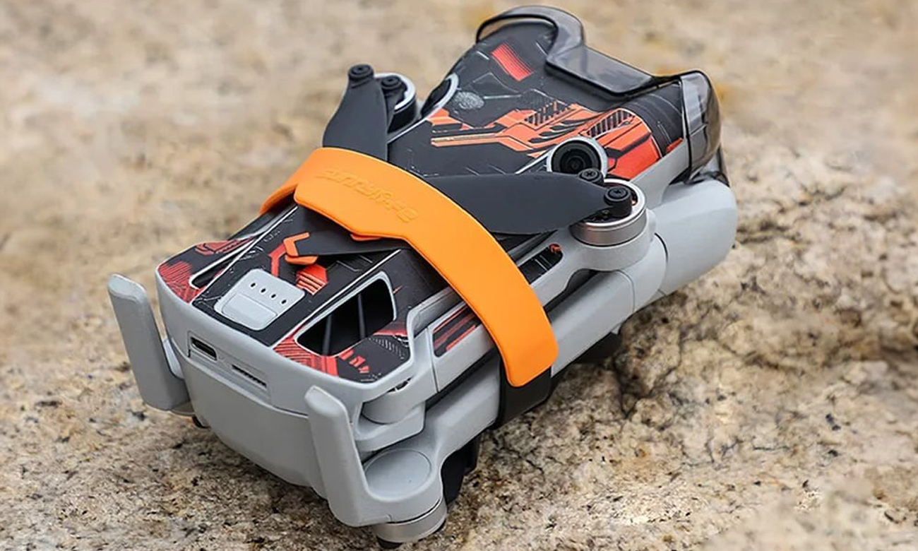 Propeller-Sperre Sunnylife für Drohne DJI Mini 4 Pro Orange - Lifestyle-Grafik