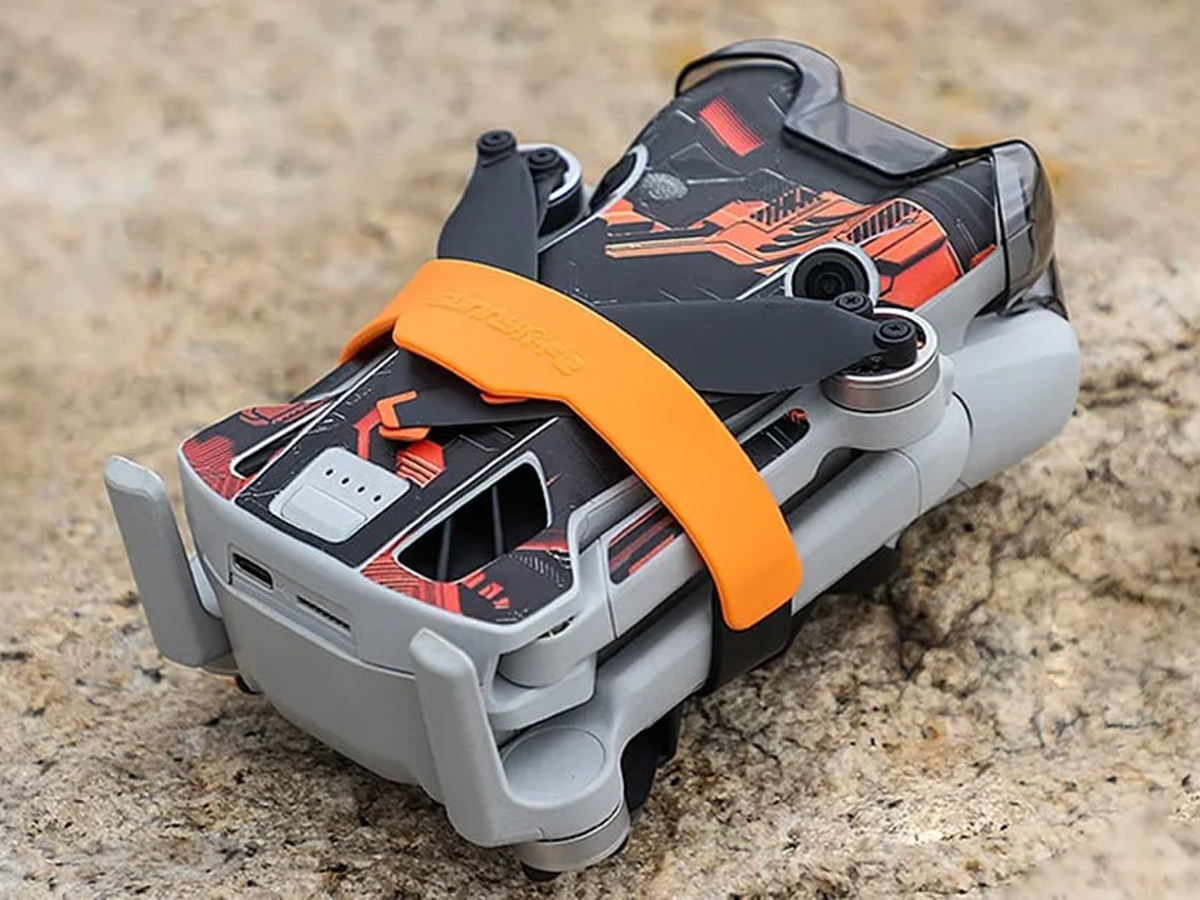 Propeller-Sperre Sunnylife für Drohne DJI Mini 4 Pro Orange - Lifestyle-Grafik