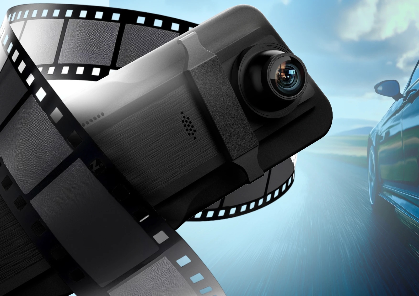 Kamera samochodowa otoczona taśmą filmową na tle drogi.